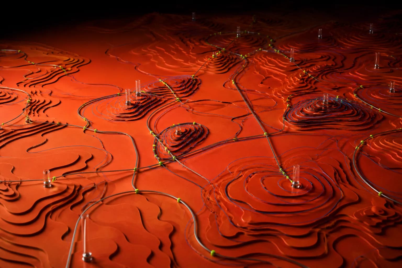 Orange topographic terrain with a connected map grid